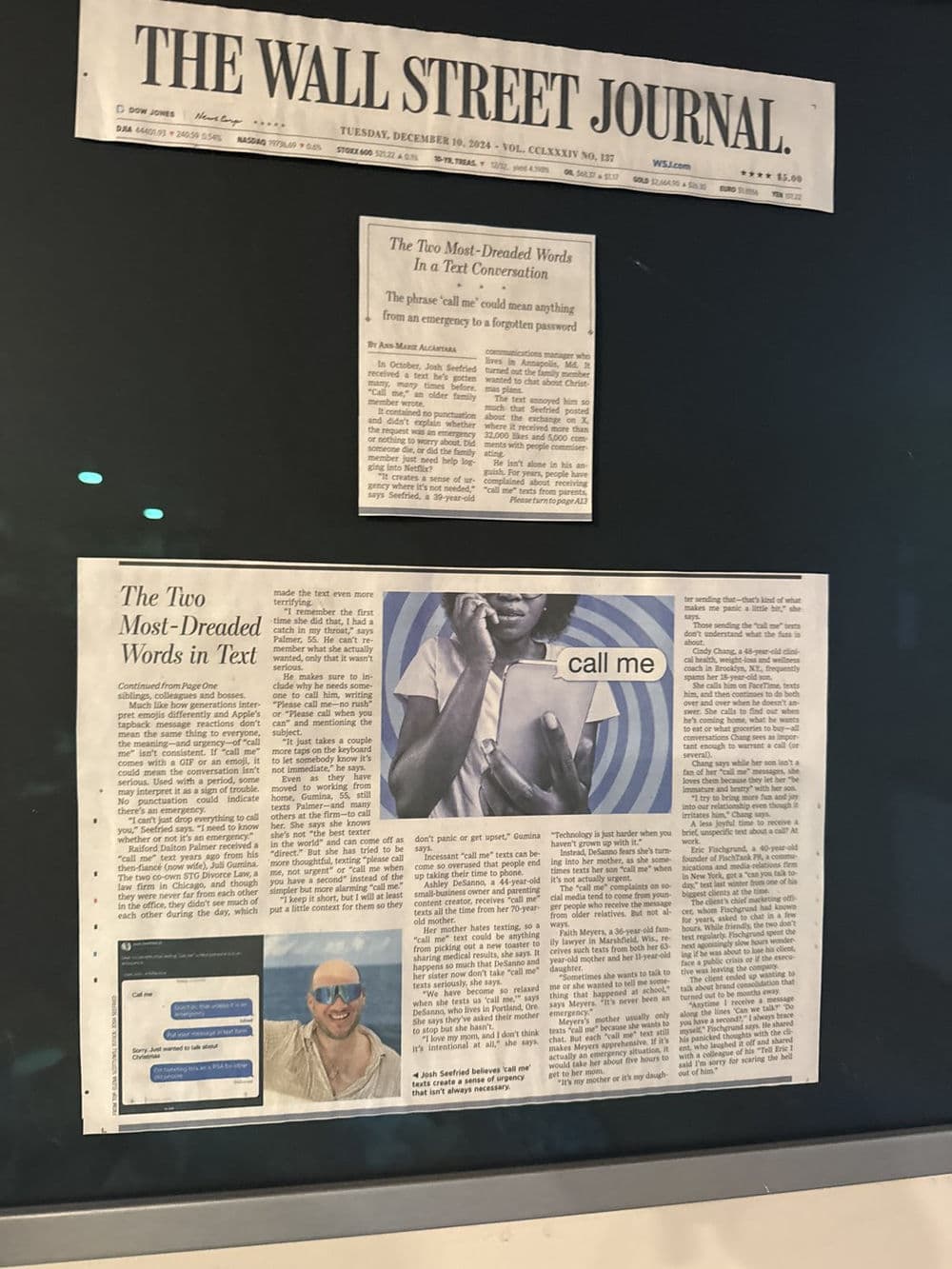 My Wall Street Journal feature pinned up: the front page and the call me story.